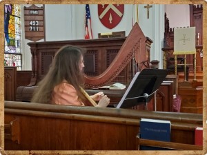 Sherri in church with Luna harp