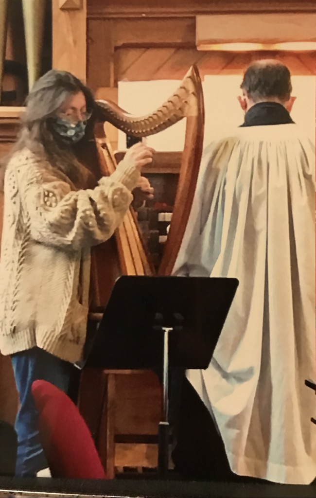 Here I am playing my cross-strung wire harp with husband George at the pipe organ, Sunday services at St. Stephen's